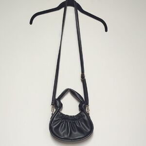 Elegant Black Crossbody Bag with Slouchy Design